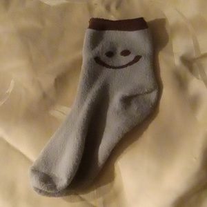 One singular gently used super soft sock